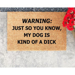 Funny dog doormat with a warning message about a mean pet, featuring bold black text on a natural coir fiber welcome mat, perfect for a porch or front door entrance to warn guests about your dog's behavior in a humorous way.