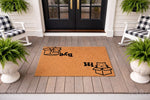 Cat in a box doormat featuring a cute feline design with Hi and Bye text on a natural coir welcome mat, displayed on a front porch with rocking chairs to create a funny and inviting entryway floor mat for cat lovers and home