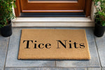 Personalized family name doormat featuring custom text on a natural coir fiber welcome mat, placed on a front porch entryway to provide a stylish and durable floor covering for your home entrance and outdoor decor.