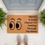 Funny Peeking Through The Blinds doormat featuring cartoon eyes on a natural coir fiber welcome mat, perfect for a front porch entry.