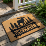 Moose welcome doormat featuring a rustic forest scene with pine trees and a large moose silhouette, this natural coir fiber welcome mat is a stylish outdoor floor rug for your cabin, lodge, or farmhouse front porch entryway decor.