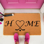 Hockey home doormat with a heart design made of crossed sticks, this natural coir welcome mat features a sports theme for front porch decor, perfect for hockey fans who want a durable outdoor rug for their entryway or house