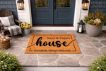 Personalized Nana and Papa house doormat featuring a natural coir fiber texture, displayed on a stone porch as a custom family welcome mat for grandparents, with the text Grandkids Always Welcome printed in a modern black script