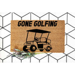 Gone Golfing coir doormat featuring a black golf cart graphic on natural fiber, this funny outdoor welcome mat is a great front porch decor piece for golf lovers and makes a unique housewarming entry rug for any home or golf