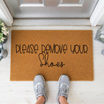 a door mat that says please remove your shoes