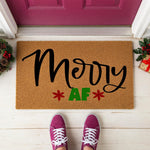 a door mat that says merry af on it