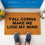 a door mat that says y'all conna make me lose my mind