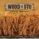 a close-up of a straw mat or straw-like material, with the text "WOOD BY STU" prominently displayed above it.