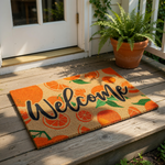 a vibrant and colorful welcome mat with the word "Welcome" prominently displayed in the center.
