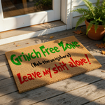 a door mat that says grin free zone not the neighbor leave my shit alone