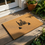 A black cat silhouette with the word "Hello" written above it, placed on a beige carpet.