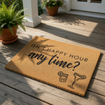 A textured area rug with the text "ISN'T HAPPY HOUR ANY TIME?" printed on it, along with two cocktail glasses.