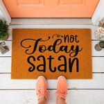 a door mat that says not today satan