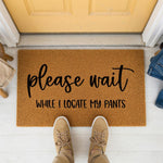 a door mat that says please wait while i locate my pants