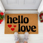 a door mat with the words hello love on it