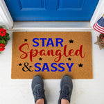a door mat that says star spangled and sassy