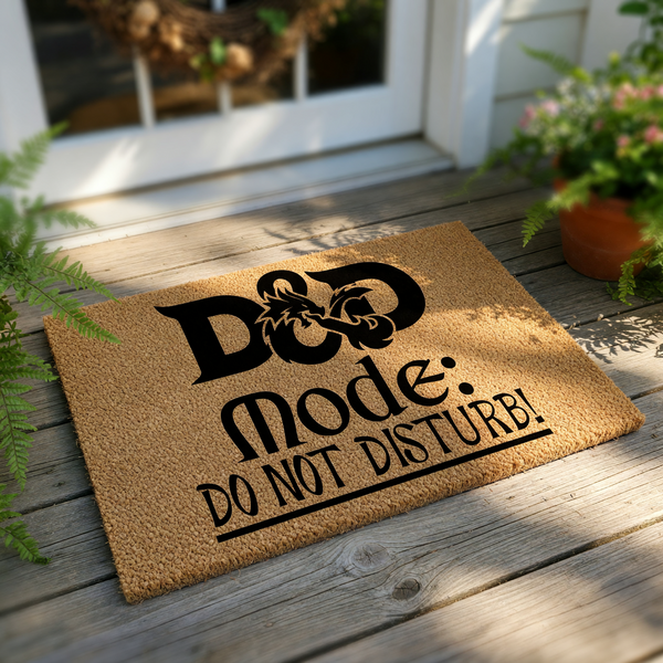 A wooden door mat with a black and white design featuring the letters "D&D" and the phrase "Mode: Do not disturb!"