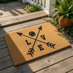 A wooden door mat with a black graphic design featuring an arrow and a tennis ball, along with the word "LOVE" written below.