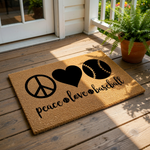A door mat with the words "Peace, love, baseball" printed on it, along with a peace sign, a heart, and a baseball.