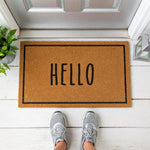 a door mat with the word hello on it