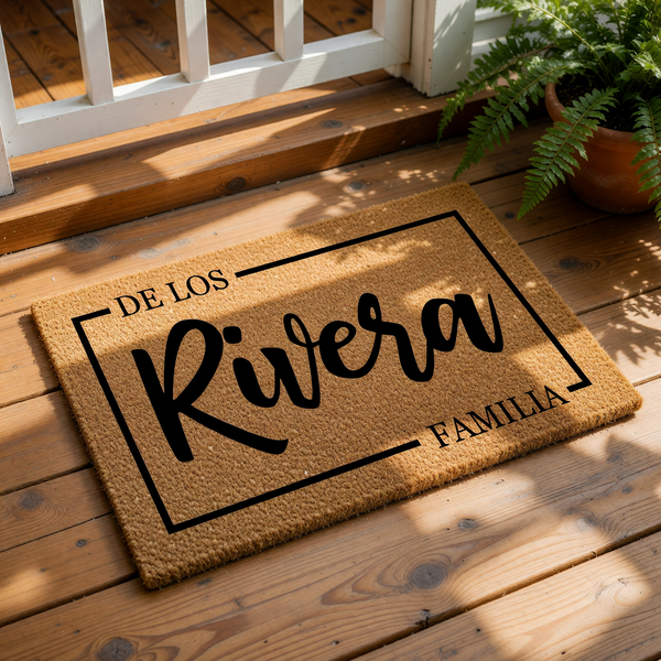 A decorative doormat with the text "Riversa Familia" printed on it.