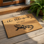 A black and white illustration of a lizard on a textured surface, with the text "The Robinsons EST 2019" printed above it.