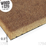 a close-up of a straw mat or straw-like material, with the text "WOOD BY STU" prominently displayed above it.
