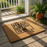A textured area rug with a speech bubble design that says "PLEASE DON'T TALK TO ME..."