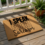 A textured door mat with the phrase "I SPEAK FLUENT SARCASM" printed on it.