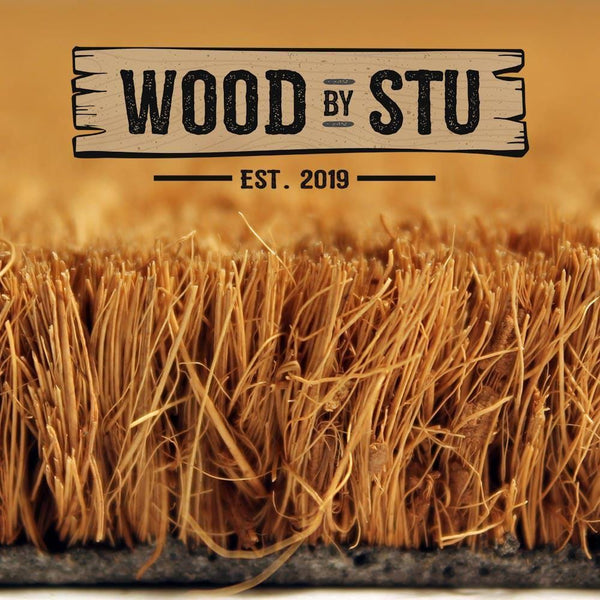 a close-up of a straw mat or straw-like material, with the text "WOOD BY STU" prominently displayed above it.