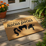 A rectangular door mat with the text "It's just a bunch of hocus pocus" printed on it.