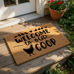 a textured area rug with the phrase "Welcome to our Coop" printed on it.