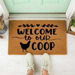 a welcome mat that says welcome to our coop