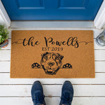 a door mat with a dog's face on it