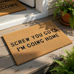 A textured doormat with the message "SCREW YOU GUYS I'M GOING HOME" printed on it.