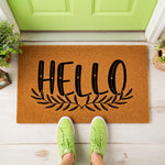 a door mat with the word hello written on it