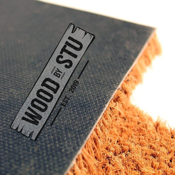 a logo for a company called "Wood by Stu" with a textured background and a wooden plank design.