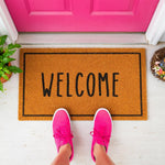 a welcome mat with the word welcome on it