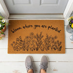 a welcome mat that says,'welcome you are planted '