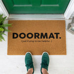 a door mat that says, doormat just trying to be helpful