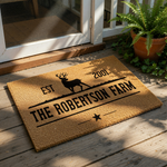a wooden mat with a logo for "The Robertson Farm" and a deer silhouette.