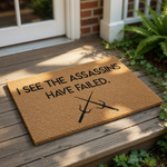 a rectangular, light brown, textured surface with a black graphic design on it.