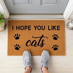 a door mat that says i hope you like cats