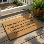 a textured doormat with the following text: "I will not be a doormat I will not be a doormat I will not be a doormat"