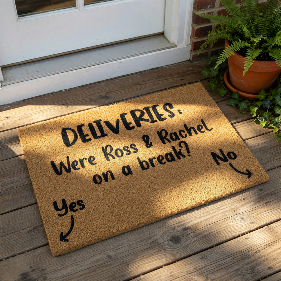 A textured doormat with the text "Deliveries: Were Ross & Rachel on a break?" printed on it.