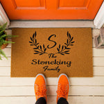 a door mat that says the stoneking family