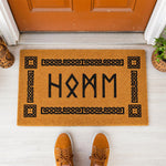 a door mat with the word mmh on it