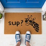 a door mat with a picture of a giraffe on it