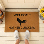 a welcome mat with a rooster on it