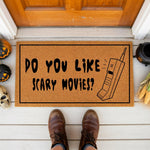 a door mat that says do you like scary movies?